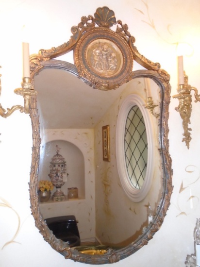 Antique Mirror with decorative wood frame.