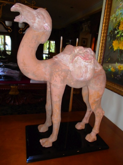 Large Chinese Tang Dynasty (618-907) Pottery Camel sculpture on black acrylic base.