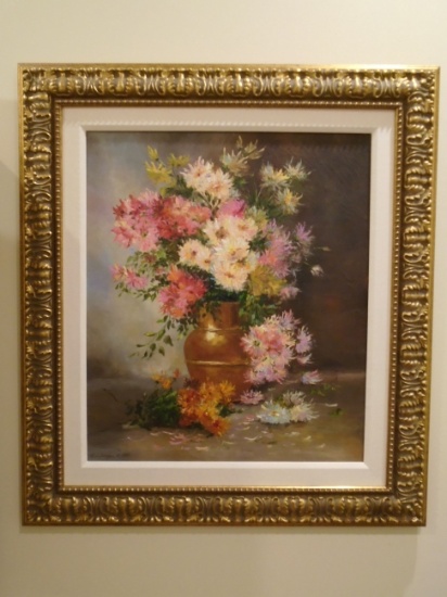 Oil Painting of a vase of flowers, in a gold frame.