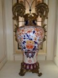 Pair of Large Antique Imari Porcelain vases with Dore bronze handles, feet & details.