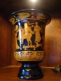 Pair of Maitland Smith Porcelain vases, black with gold figural motif.