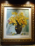 Oil Painting of flowers in a pot in a gold frame.