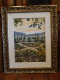 Landscape scene oil painting in a gold frame. Hand signed by the artist.