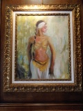 Oil painting of a Belly dancer, in a gold frame.