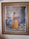 Oil painting of a woman at the wailing wall carrying a tray of fruit, in a gold & black frame.
