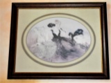Wall art in a frame. Depicts 2 women sitting at a table with a cat.  Hand signed by the artist Louis