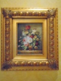 Oil painting in a gold frame, depicts flowers in a pot. Hand signed by the artist Willams.