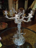 Solid metal candleabra, 2 dogs at the base, holds 6 candle sticks.