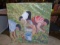 Oil painting on canvas. Depicts 3 people picking flowers.