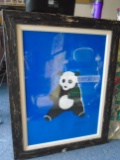 Framed wall art, depicts a panda with blue background.