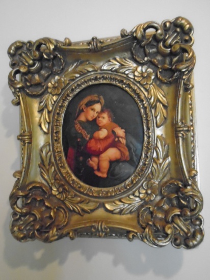 Oil painting depicting a mother holding a child.