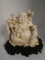 Carved and etched hippo ivory Sculpture of buddha with 5 children figures