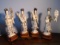 Set of 4 Carved and etched hippo ivory Sculptures of Geisha girls all holding different objects.