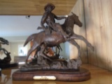 Breakin Cowboy with rifle, riding a horse Sculpture