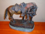 The Last Drop Cowboy feeding his horse Bronze Sculpture