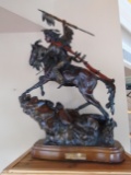 Day of Honor Indian riding a horse holding up a spear Bronze Sculpture