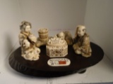Carved and etched hippo ivory Sculpture of 3 figures eating