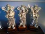 Set of 3 Carved and etched hippo ivory Males holding various objects.