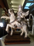 Pair of Carved and etched hippo ivory Sculptures of a King & Queen on horses.