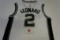 Kawhi Leonard signed San Antonio Spurs basketball jersey.