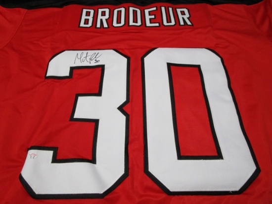 Martin Brodeur of the New Jersey Devils autographed red hockey jersey Certified COA 756