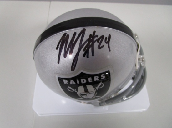 Marshawn Lynch of the Oakland Raiders signed autographed mini football helmet COA 655