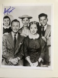 Photos of the cast from Father Knows Best autographed by Lauren Chapin.