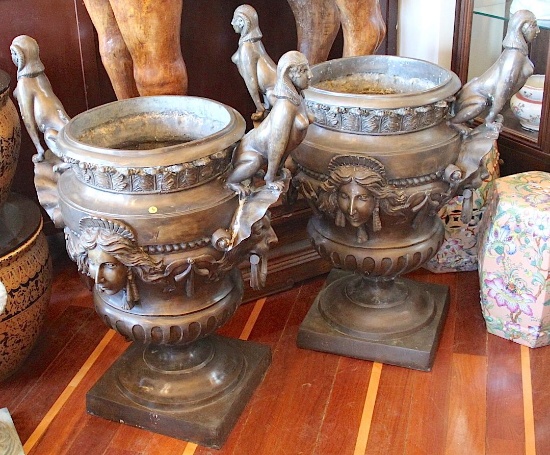 One pair  Bronze Greek urns with sphinx handles