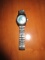 Murat Watch Mid size with aqua face and stainless band- New with no Box