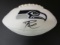 Russell Wilson of the Seattle Seahawks signed autographed logo football PAAS COA 544