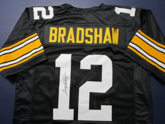 Terry Bradshaw of the Pittsburgh Steelers signed autographed football jersey PAAS COA 563