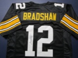 Terry Bradshaw of the Pittsburgh Steelers signed autographed football jersey PAAS COA 563