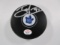 John Tavares of the Toronto Maple Leafs signed autographed logo hockey puck PAAS COA 041