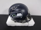 Russell Wilson of the Seattle Seahawks signed autographed mini football helmet PAAS COA 870