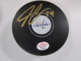 John Carlson of the Washington Capitals signed autographed logo hockey puck PAAS COA 023