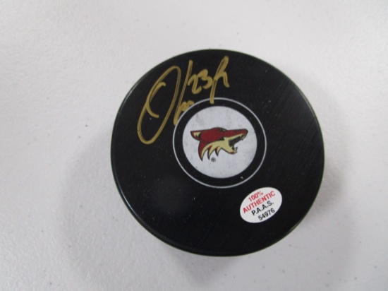 Oliver Larsson of the Phoenix Coyotes signed autographed hockey puck PAAS COA 976