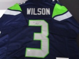 Russell Wilson of the Seattle Seahawks  signed autographed football jersey PAAS COA 392