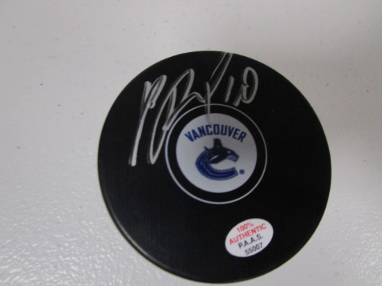 Pavel Bure of the Vancouver Canucks signed autographed logo hockey puck PAAS COA 007