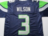 Russell Wilson of the Seattle Seahawks signed autographed football jersey PAAS COA 394