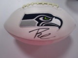 Russell Wilson of the Seattle Seahawks signed autographed logo football PAAS COA 548