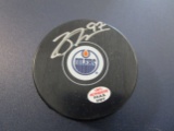 Connor McDavid of the Edmonton Oilers signed autographed logo hockey puck PAAS COA 977