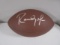 Randy Moss of the Minnesota Vikings signed autographed brown football AAA COA 063