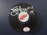 Steve Yzerman of the Detroit Red Wings signed autographed hockey puck PAAS COA 909