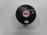 Steve Yzerman of the Detroit Red Wings signed autographed hockey puck PAAS COA 911