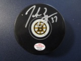 Patrice Bergeron of the Boston Bruins signed autographed logo hockey puck PAAS COA 783
