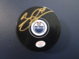 Conner McDavid of the Edmonton Oilers signed autographed hockey puck PAAS COA 063