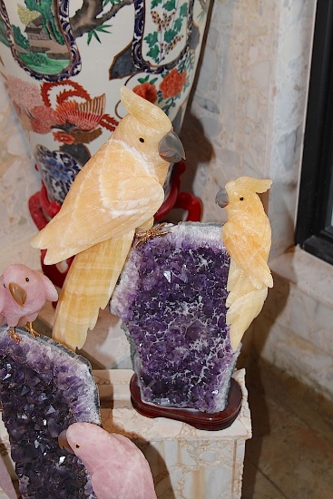 2 Large Yellow Parrots sitting on Amethyst Base