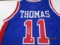 Isaiah Thomas of the Detroit Pistons signed autographed basketball jersey PAAS COA 453