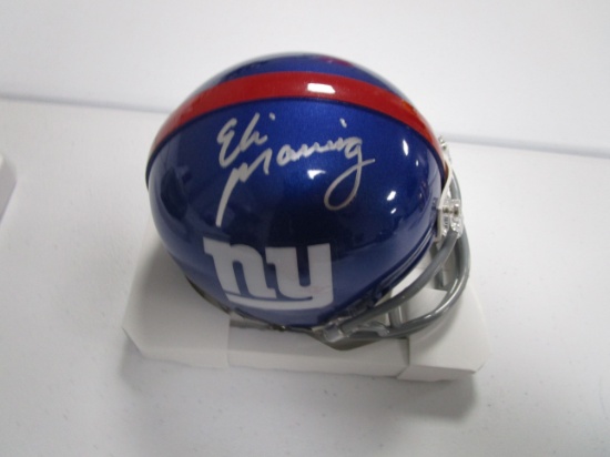 Eli Manning of the New York Giants signed autographed mini football helmet PAAS COA 194