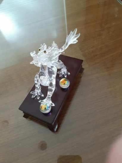 Swarovski Crystal - Dragon holding crystal balls on rosewood base